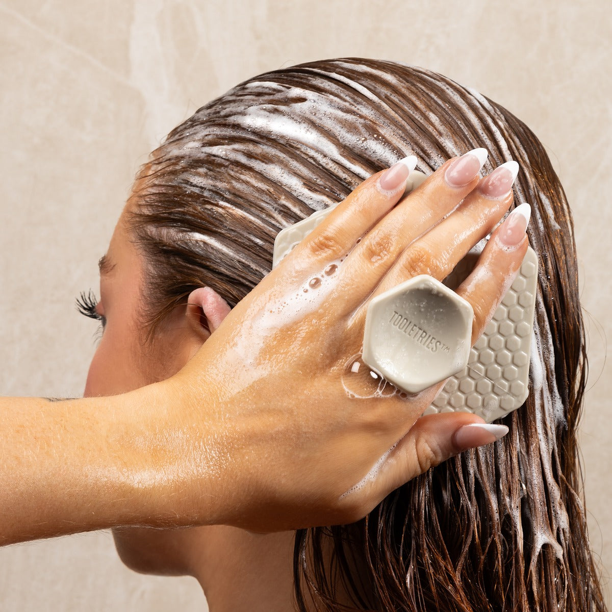 The Scalp Scrubber Sand